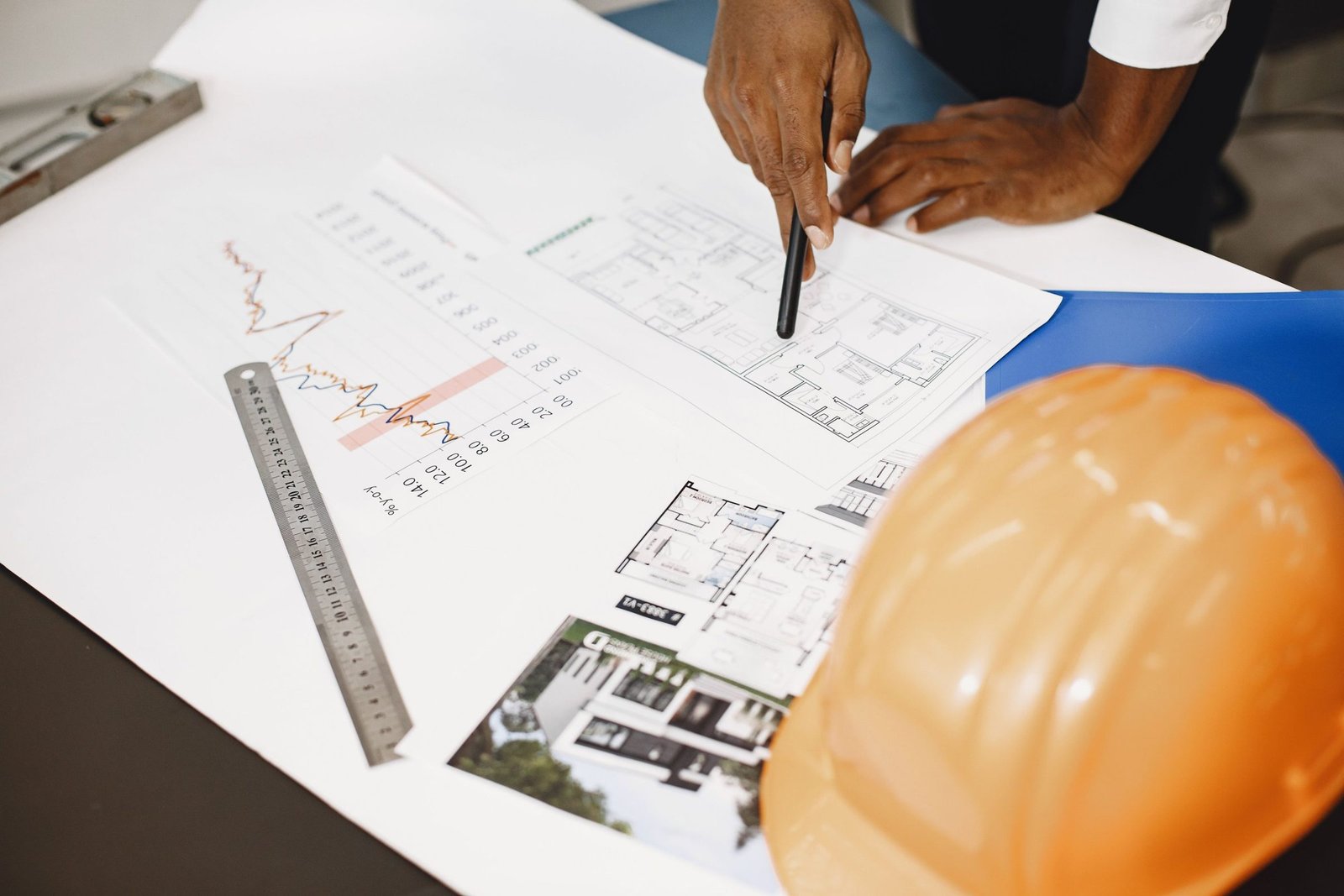 Overhead view of an HPW project team reviewing drawings on site